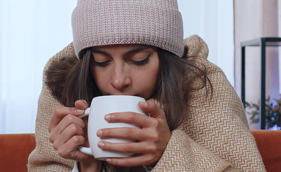 Illustration alternative boisson chaude couverture et bonnet : un poêle à bois Invicta